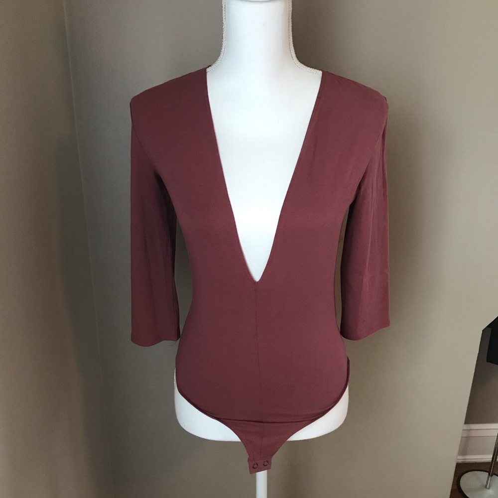 NWOT Deep plunge thong bodysuit